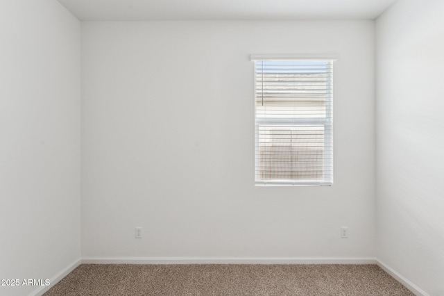 17806 W Vogel Ave, Waddell, AZ 85355 - carpeted spare room with baseboards