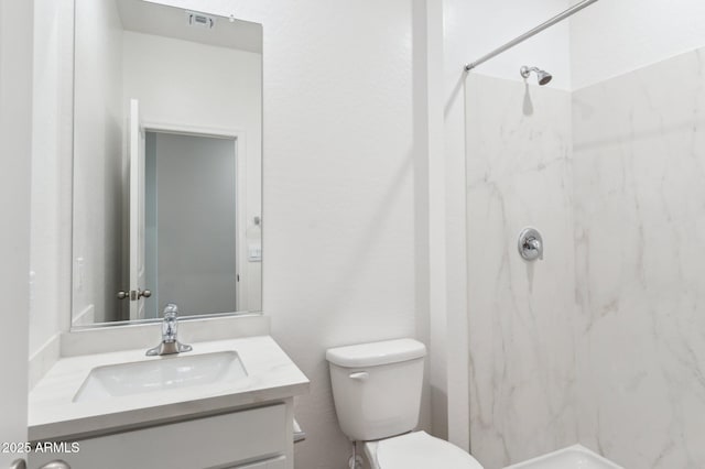 17806 W Vogel Ave, Waddell, AZ 85355 - bathroom with a marble finish shower, vanity, and toilet