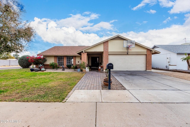 view of front of home featuring a garage, driveway, brick siding, and a front yard