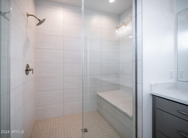 bathroom with vanity and walk in shower