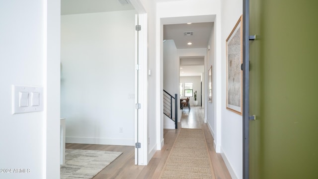 hallway featuring light hardwood / wood-style flooring