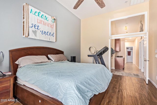 3823 E Kroll Dr, Gilbert, AZ 85234 - bedroom with wood finished floors, ceiling fan, baseboards, and vaulted ceiling