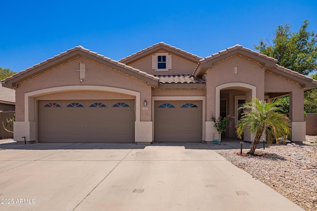 3823 E Kroll Dr, Gilbert, AZ 85234 - view of front of property featuring a tile roof, a garage, stucco siding, and driveway