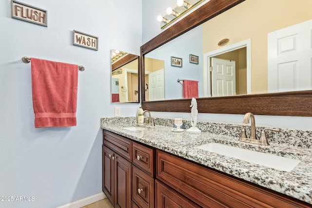 3823 E Kroll Dr, Gilbert, AZ 85234 - bathroom featuring double vanity and baseboards