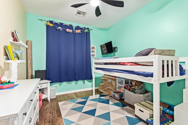 3823 E Kroll Dr, Gilbert, AZ 85234 - bedroom with wood finished floors and a ceiling fan