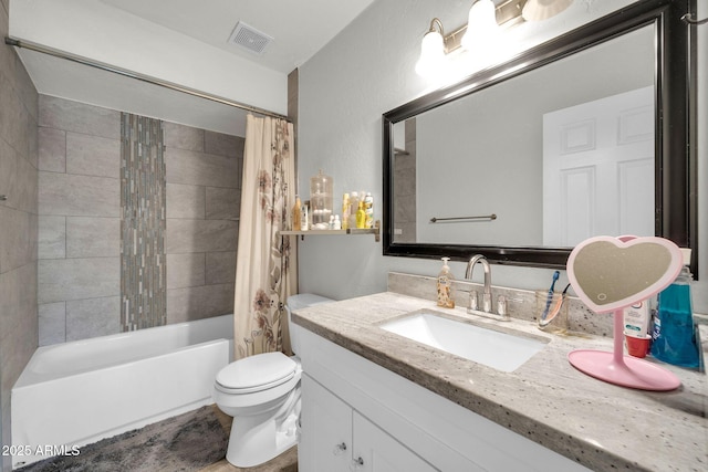 full bathroom with vanity, toilet, and shower / bath combo with shower curtain