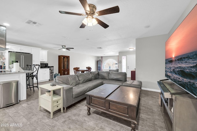 living room with ceiling fan