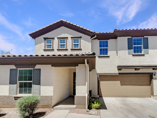 view of front of home with a garage