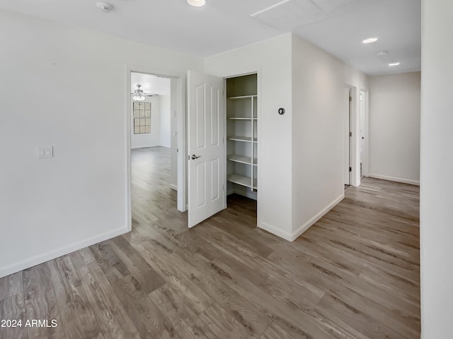 spare room with ceiling fan and hardwood / wood-style floors