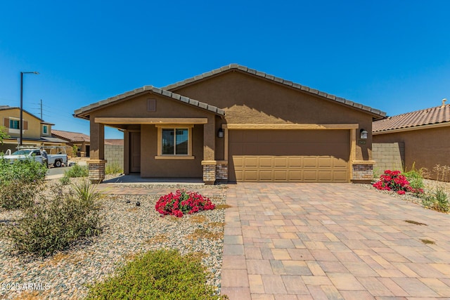 view of front of property with a garage