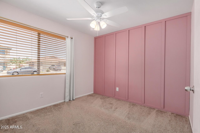 11531 E Persimmon Ave, Mesa, AZ 85212 - unfurnished bedroom with carpet flooring, a ceiling fan, and baseboards
