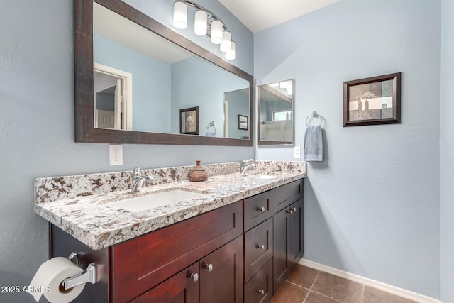 bathroom with vanity and tile patterned flooring