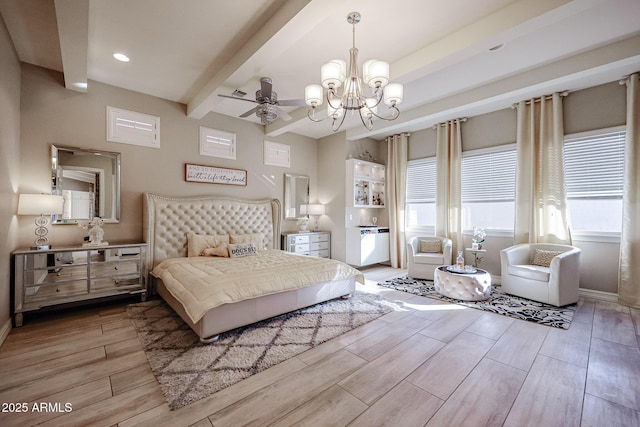 bedroom with a notable chandelier and beamed ceiling