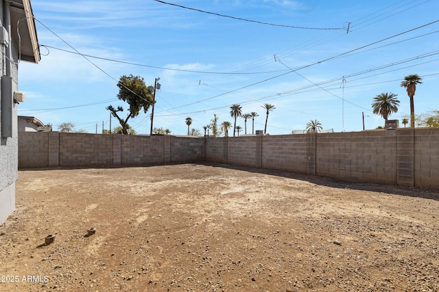 view of yard featuring a fenced backyard