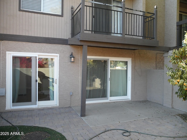 rear view of property with a patio