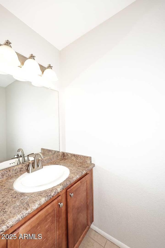 bathroom featuring vanity and tile patterned flooring