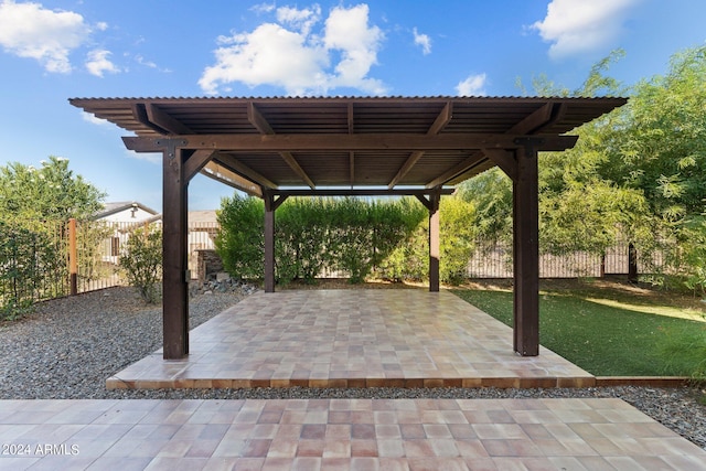 view of patio with fence and a pergola