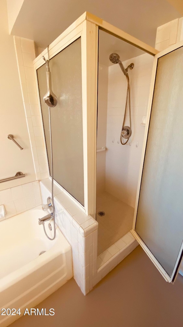 bathroom with independent shower and bath