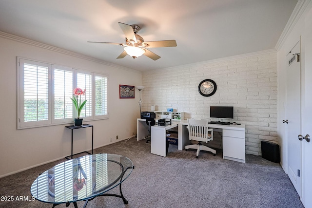 carpeted home office featuring crown molding, brick wall, and ceiling fan