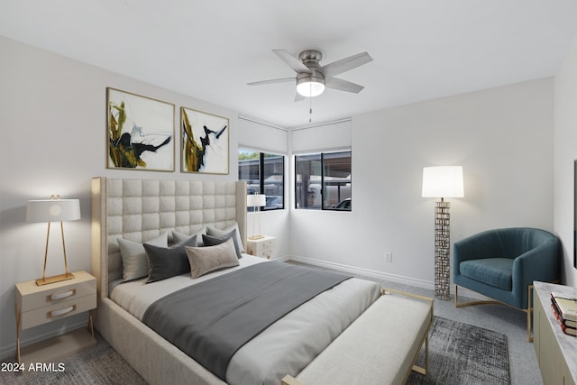 carpeted bedroom with ceiling fan