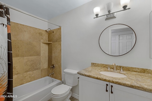 full bathroom with vanity, toilet, and shower / bath combo with shower curtain