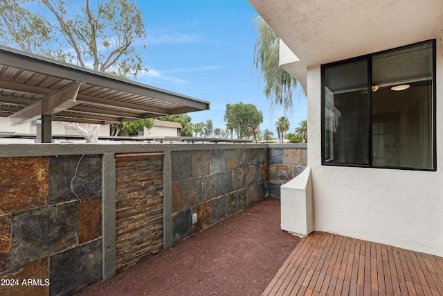 view of patio with a balcony