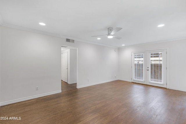 unfurnished room with ornamental molding, dark wood-type flooring, ceiling fan, and french doors