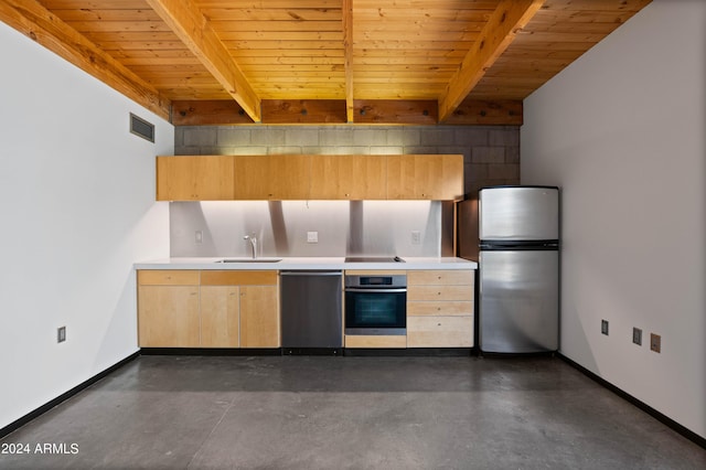 kitchen featuring appliances with stainless steel finishes, beam ceiling, sink, and light brown cabinets