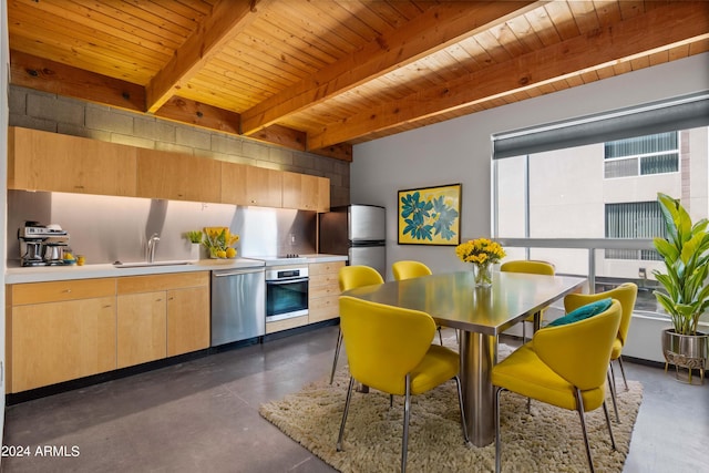 kitchen with wood ceiling, appliances with stainless steel finishes, sink, and light brown cabinets