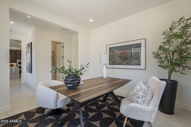 office space with recessed lighting and baseboards