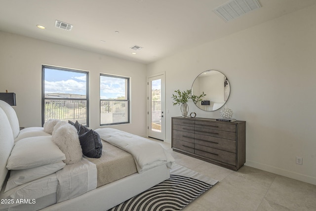 bedroom featuring visible vents, access to exterior, and multiple windows