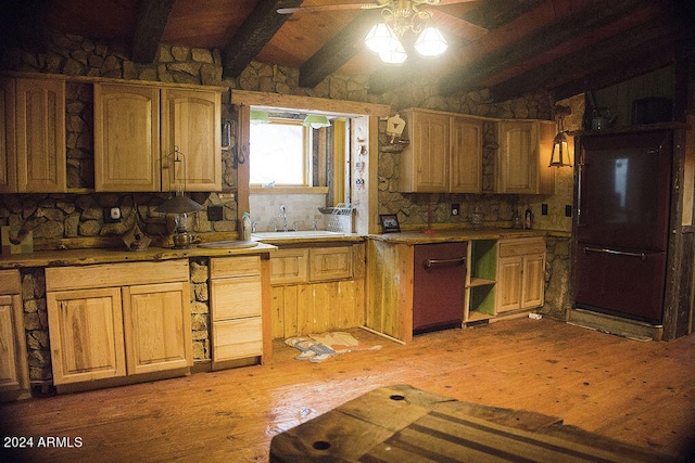 kitchen featuring beamed ceiling, sink, light wood-type flooring, and ceiling fan