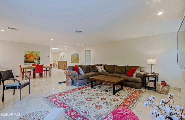 living room with visible vents and recessed lighting