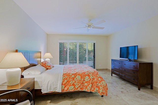 bedroom with access to outside, a ceiling fan, and baseboards