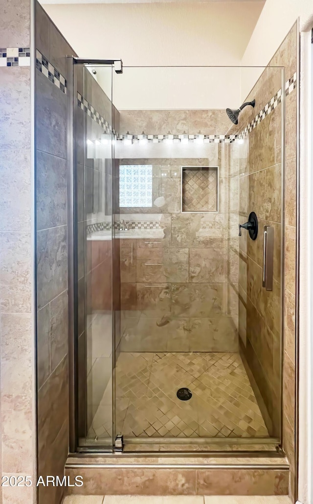 bathroom with a stall shower