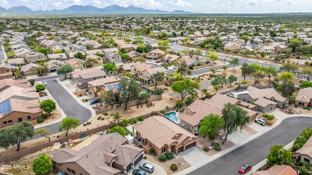 aerial perspective of suburban area featuring a mountain backdrop