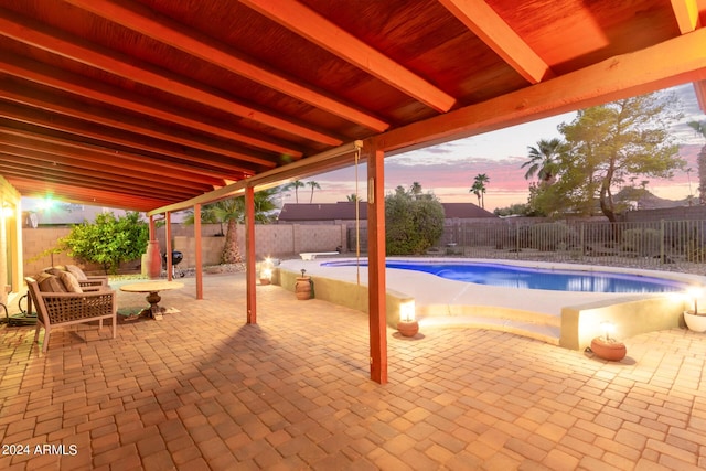 view of patio featuring a fenced in pool and a fenced backyard