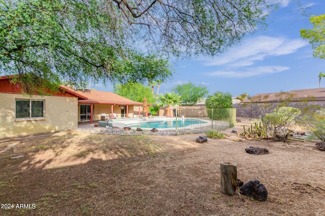 view of pool featuring a patio, a fenced backyard, and a fenced in pool