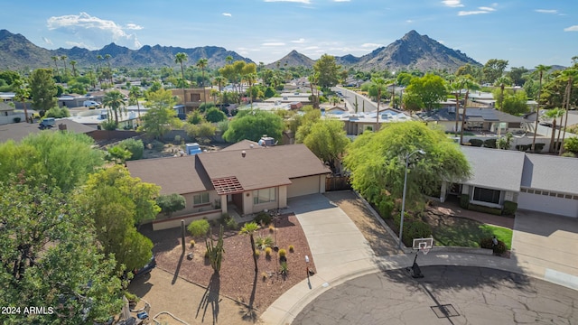 aerial view with a mountain view and a residential view