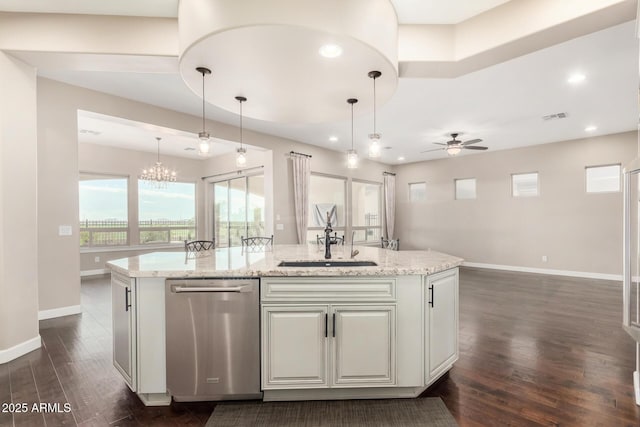 kitchen with white cabinetry, an island with sink, dishwasher, and decorative light fixtures