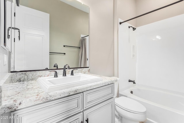 full bathroom featuring vanity, toilet, and shower / bath combo