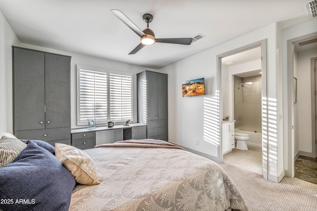 bedroom with connected bathroom and ceiling fan