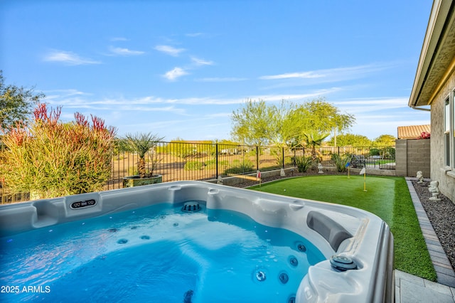 view of pool featuring a hot tub