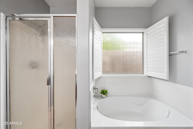 16763 W Magnolia St, Goodyear, AZ 85338 - full bathroom with a shower stall and a bath