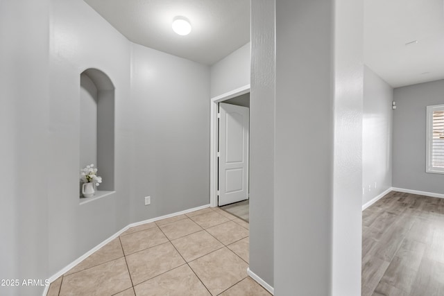 16763 W Magnolia St, Goodyear, AZ 85338 - hall with baseboards and light tile patterned flooring