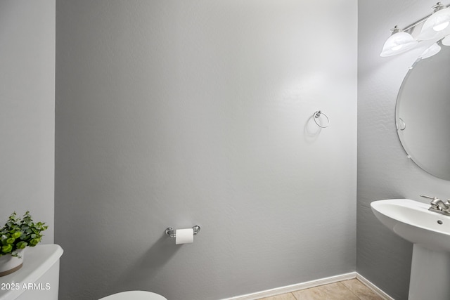 16763 W Magnolia St, Goodyear, AZ 85338 - half bath featuring toilet and a sink