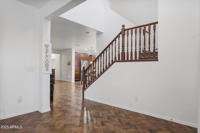 staircase with parquet floors