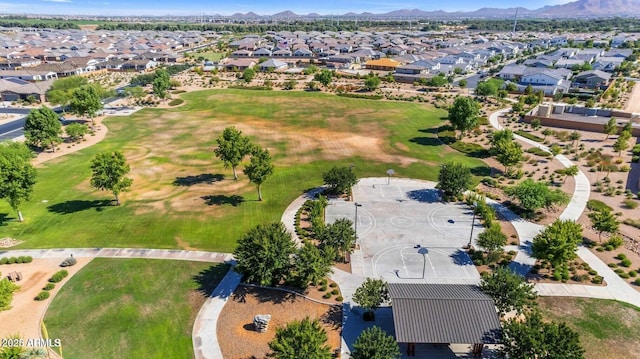 aerial view featuring a mountain view, a residential view, and view of golf course