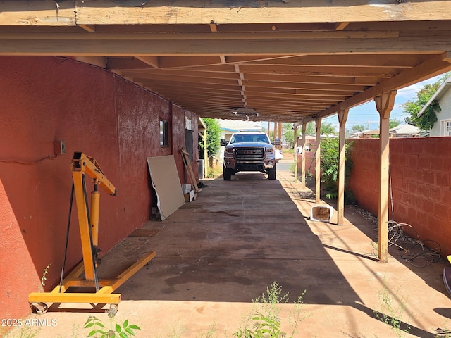 813 N Berry Ave, Winslow, AZ 86047 - view of parking featuring a carport