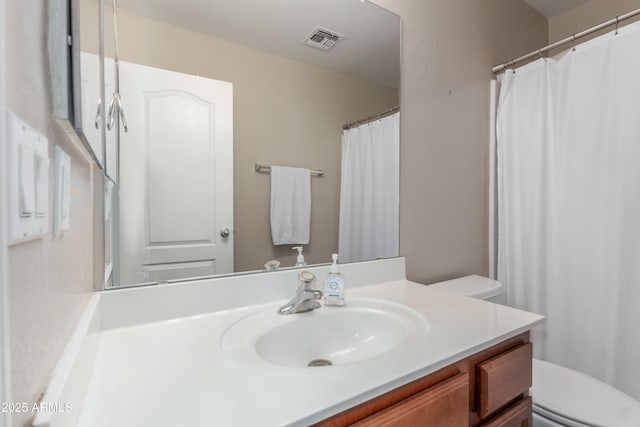 4817 W St Charles Ave, Laveen, AZ 85339 - full bath featuring toilet, vanity, and a shower with shower curtain